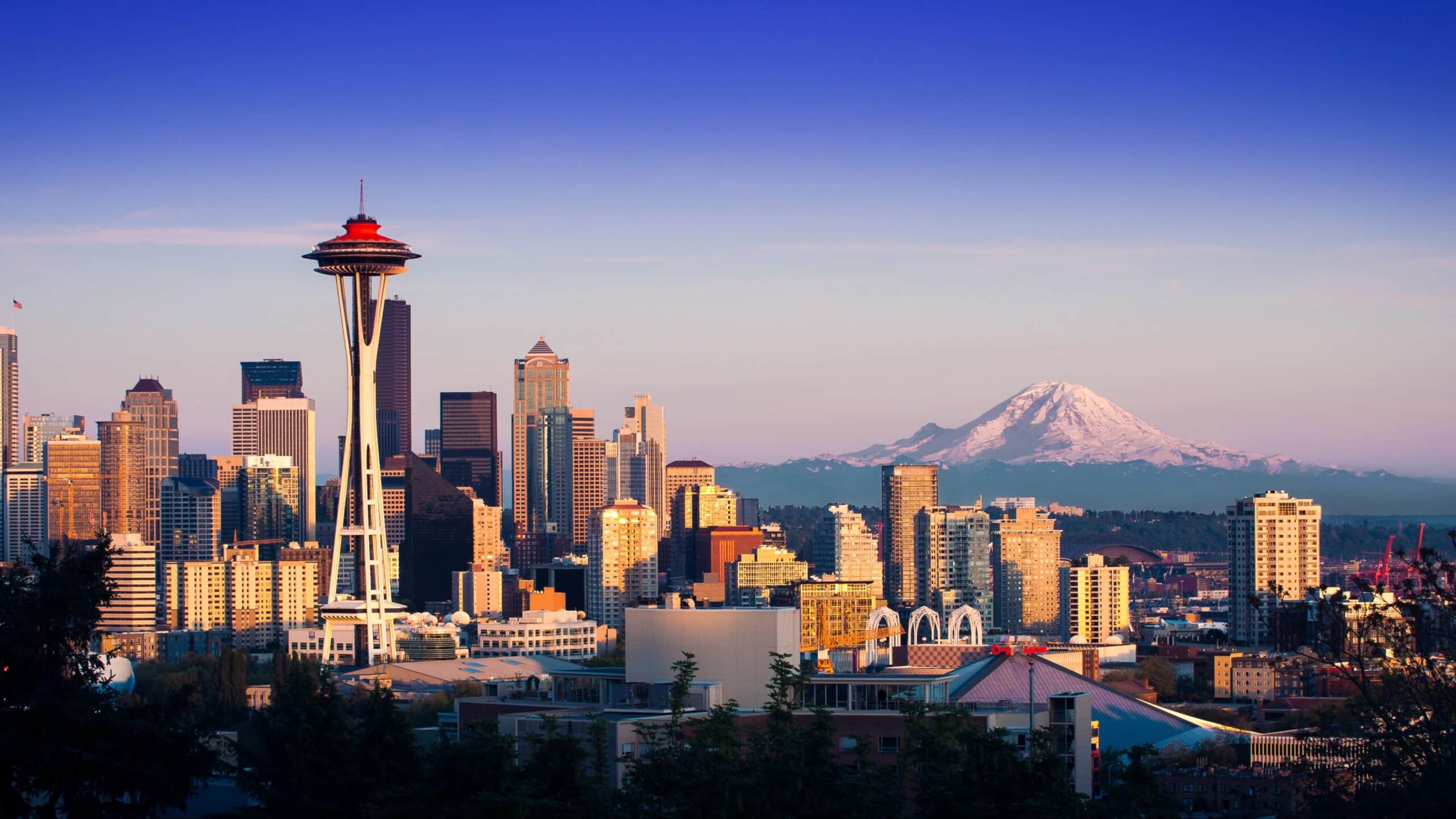 Seattle skyline with Mt. Rainier in the background during a marathon race.