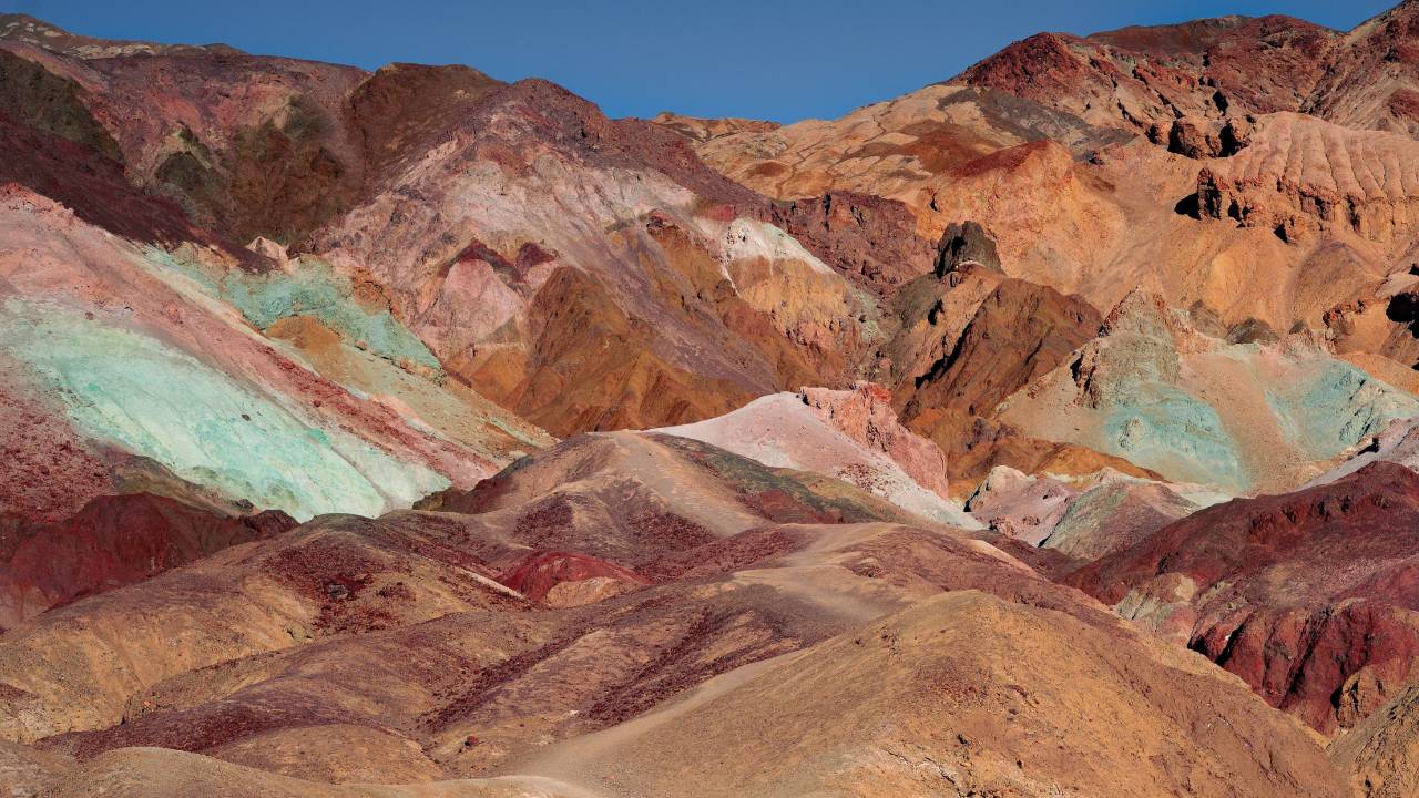 Death Valley National Park in California is famous for its extreme heat and stunning landscapes. One of its most iconic spots is Badwater, a vast salt flat that sits at an elevation of 282