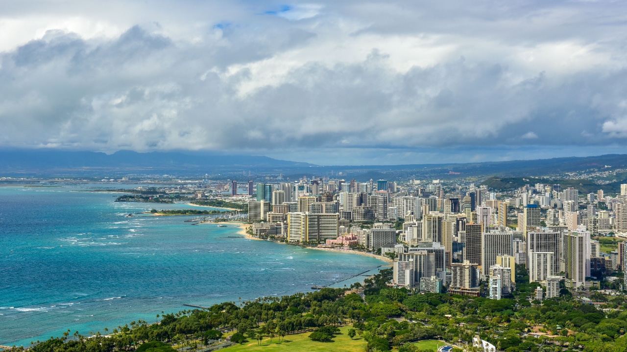 The Honolulu Marathon showcases the picturesque skyline of Honolulu, Hawaii.