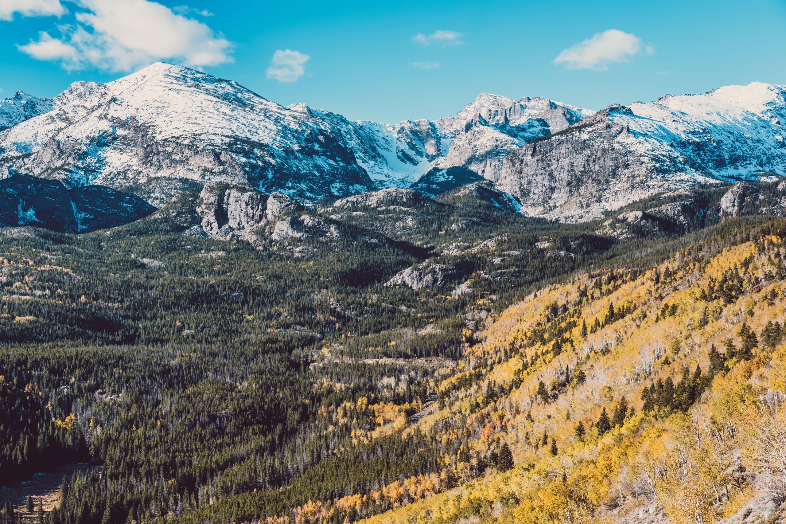 A mountain range with trees and mountains in the background.