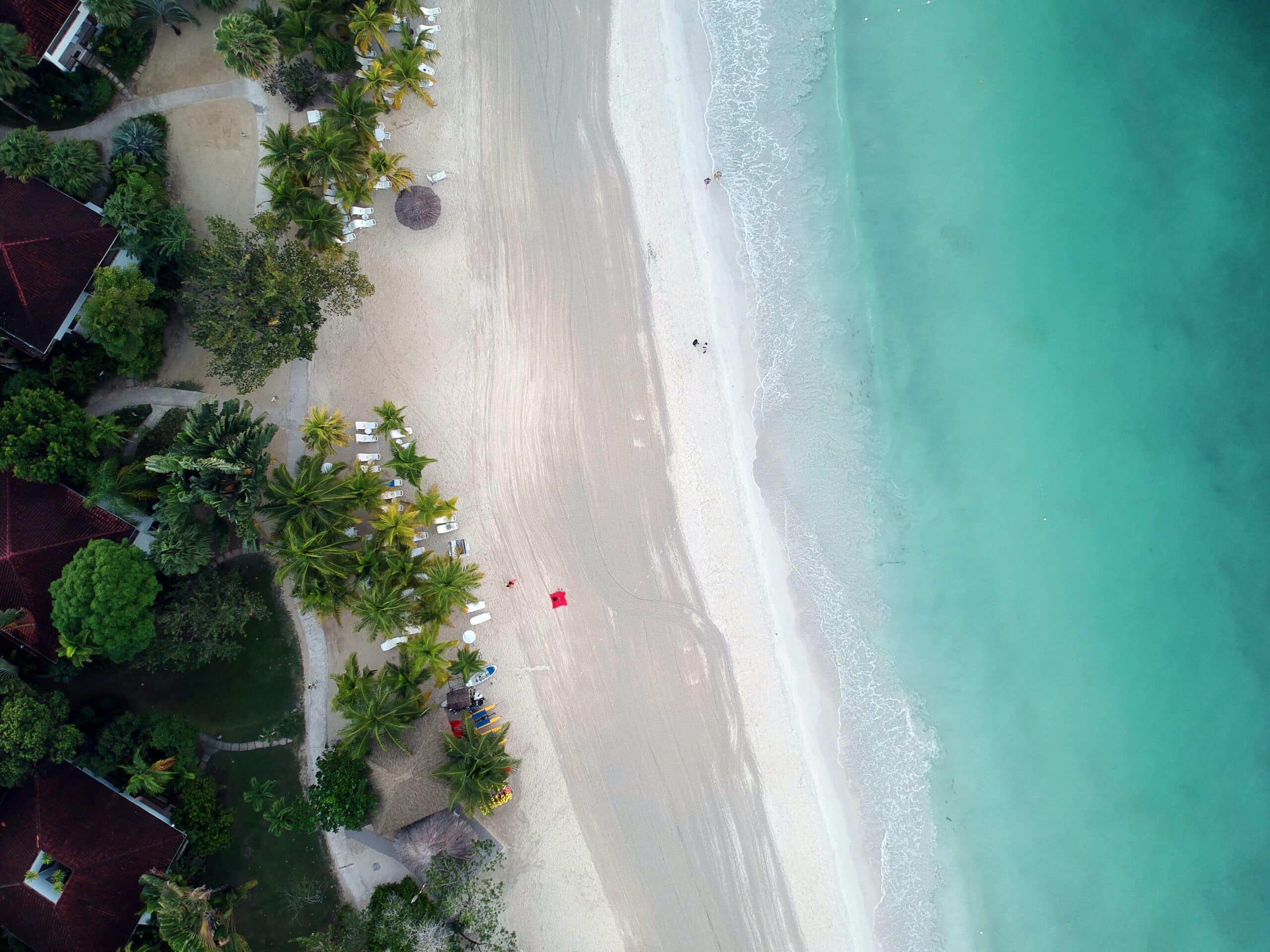 An aerial view of a beach and resort.