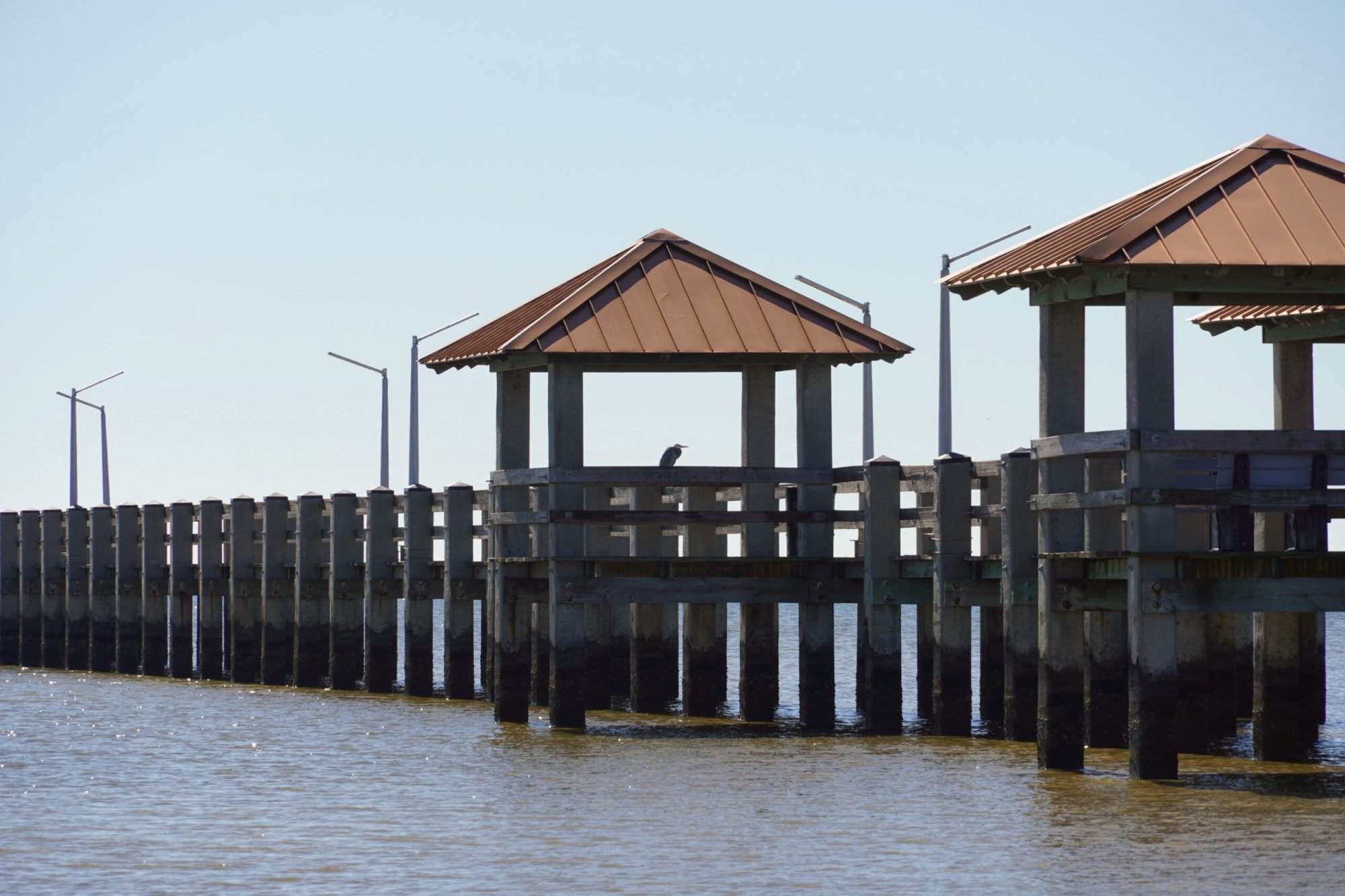 A wooden pier in the water.