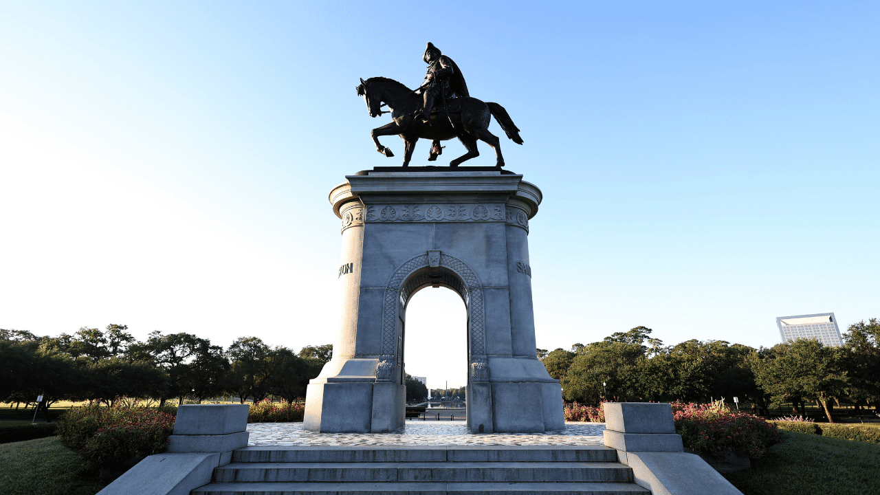 A statue of a man on a horse in Houston.